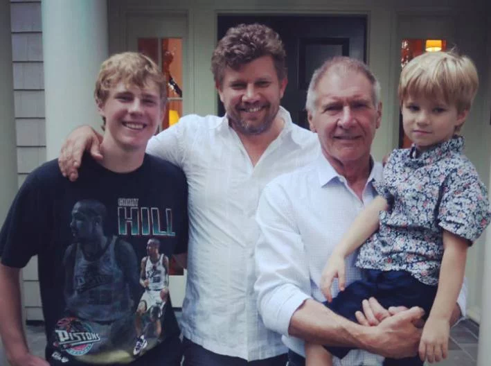 Harrison Ford with sons and grand child